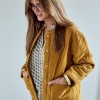 Woman quilted velvet jacket Bronze